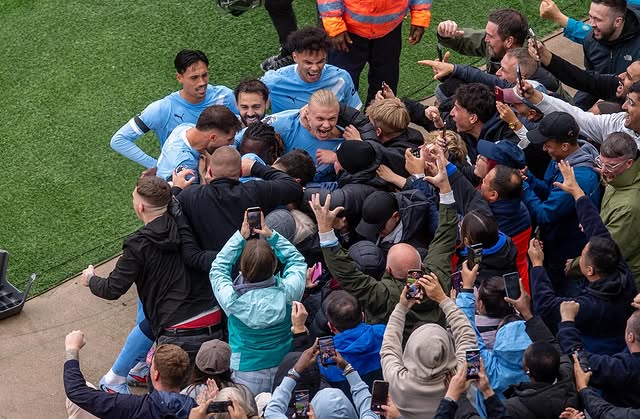 庆祝曼市德, div